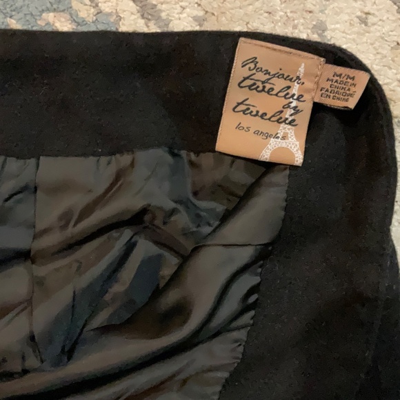 Knit mini skirt with faux fur trim - Picture 4 of 5